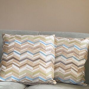2 Multi striped accent throw pillows. Cream , tans, gold , blue,  green stripes